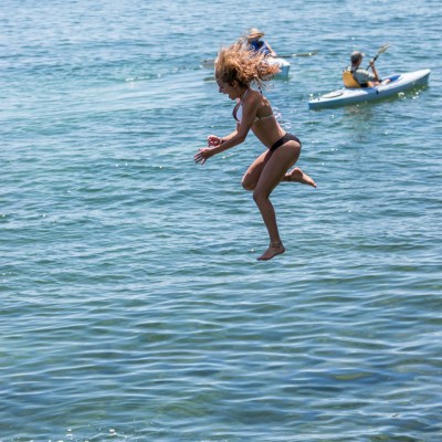 Woman jumps from a bluff into Lake Michigan in Door County, Wisconsin