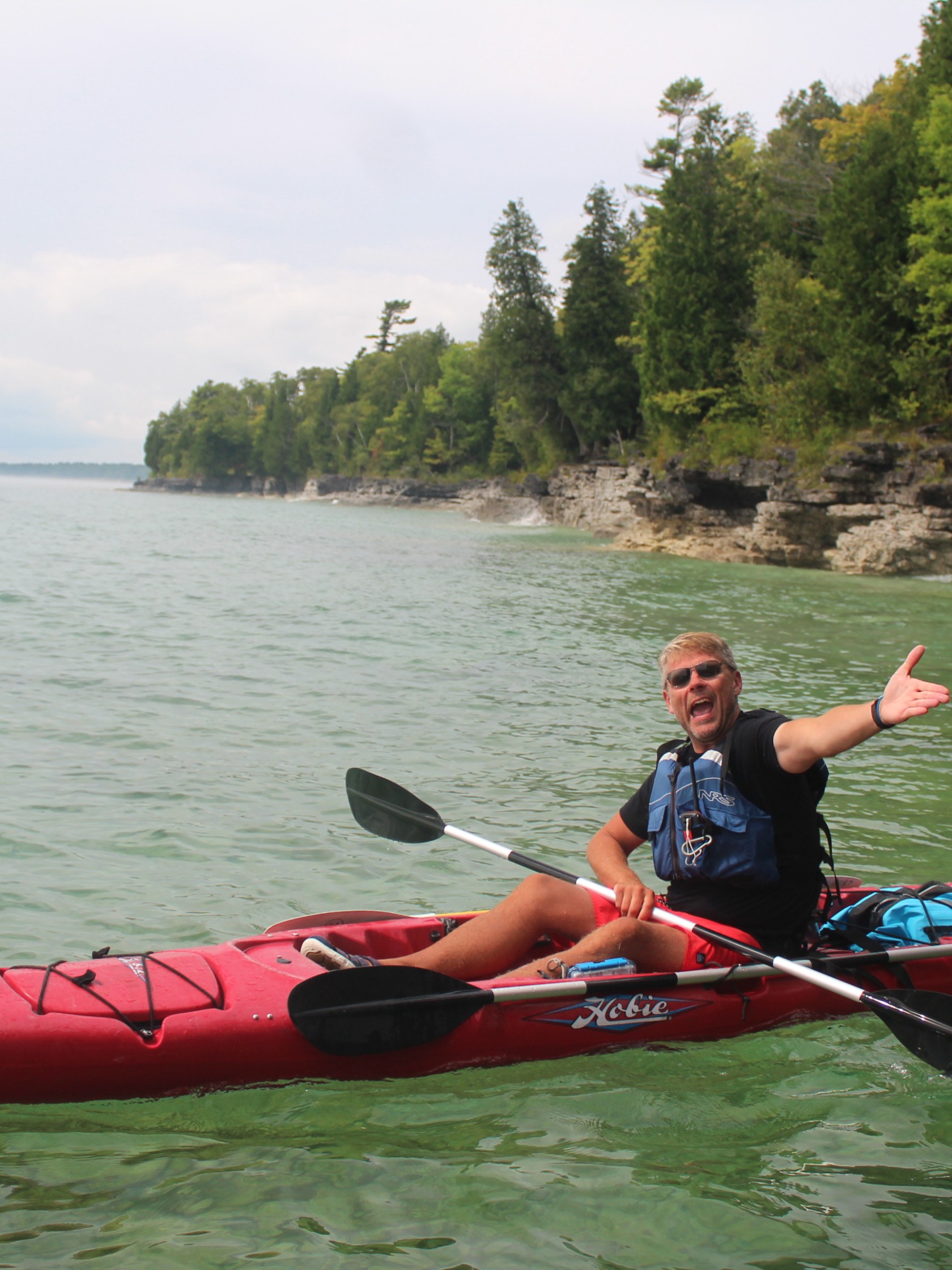 A man kayaking in Door County, Wisconsin