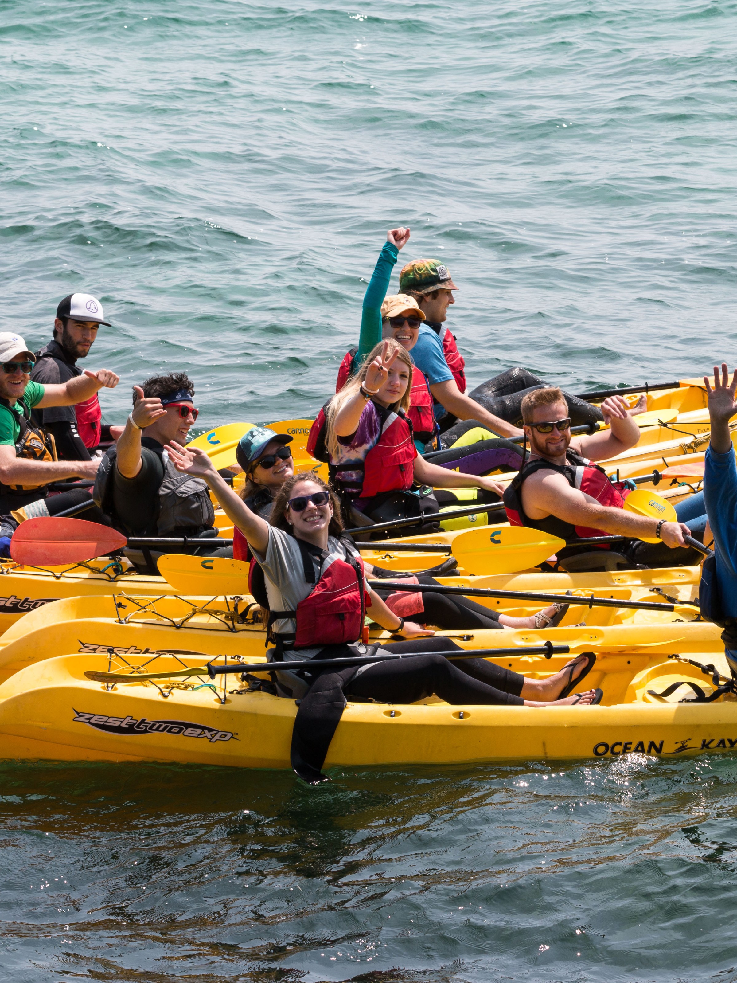 Kayakers embarking on a tour on Lake Michigan near Door County, Wisconsin