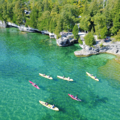 Door County coastline with kayaks in water