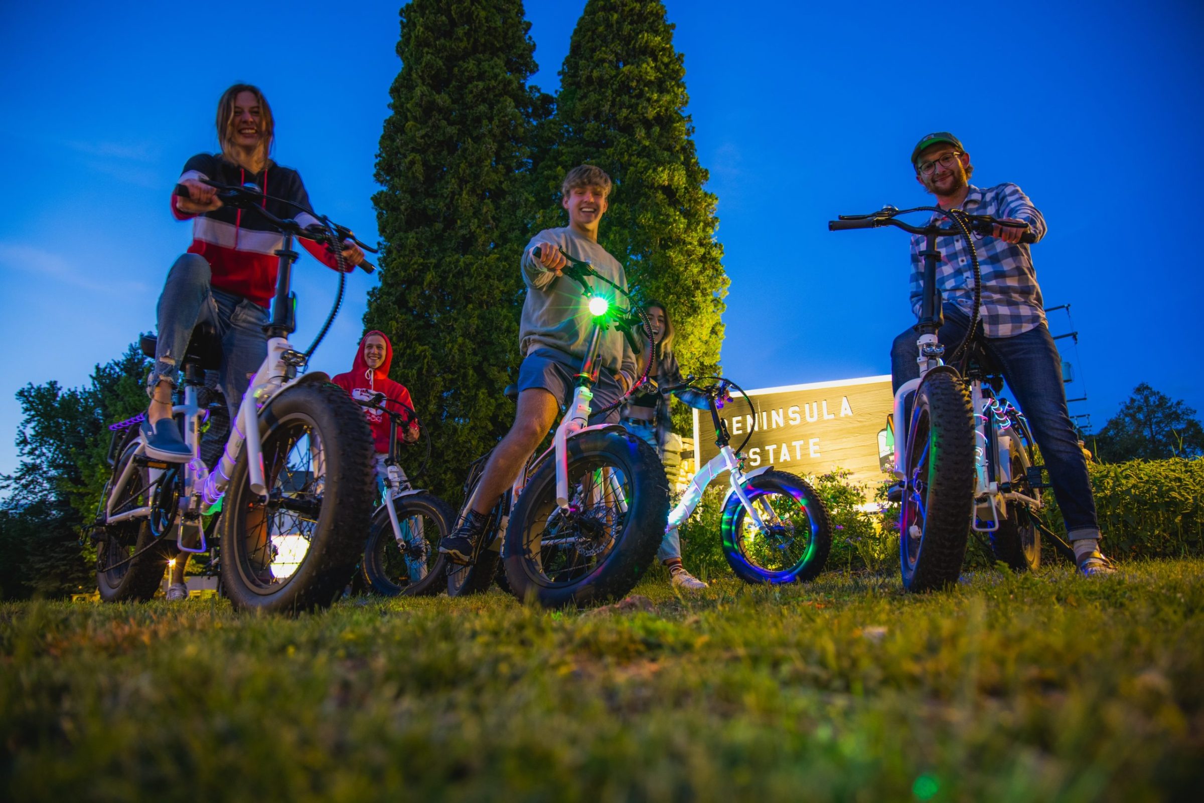 D320B382-4A78-4BE9-A827-A24B8AEEEFB8 a group of people riding on the back of a motorcycle