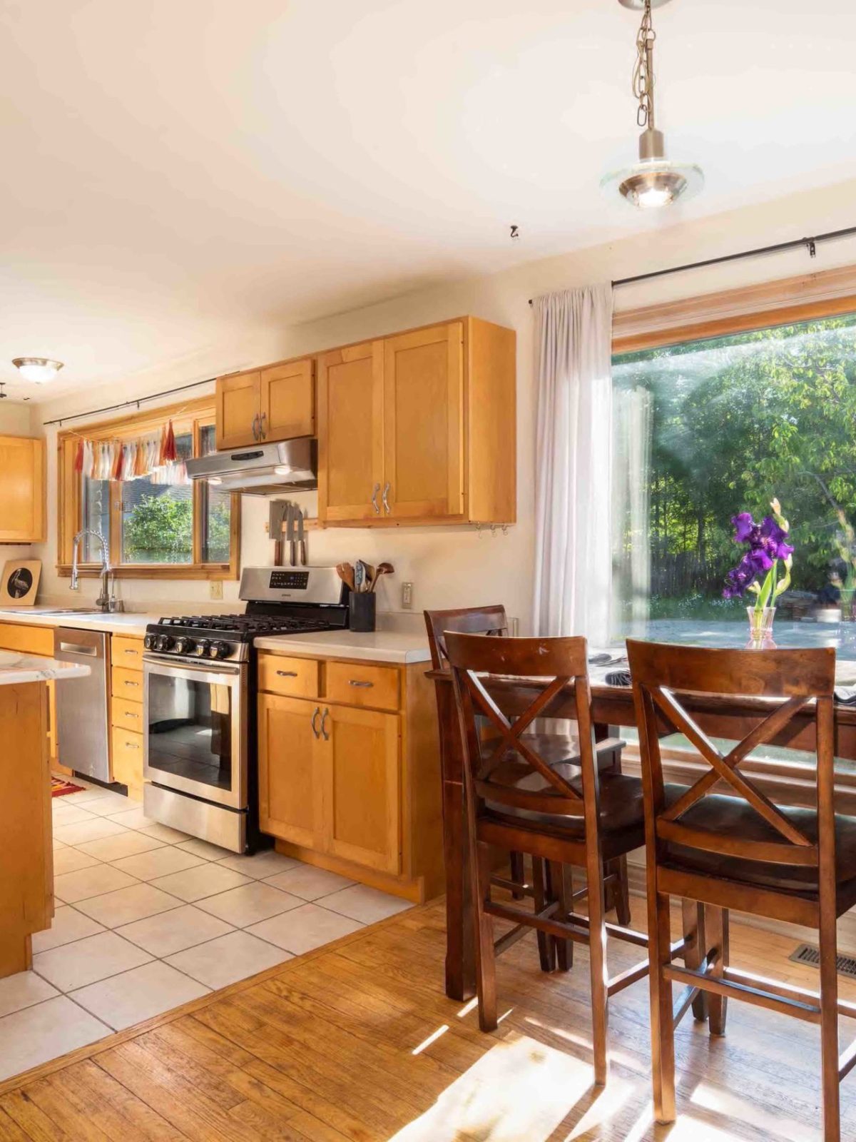 a kitchen with a dining room table