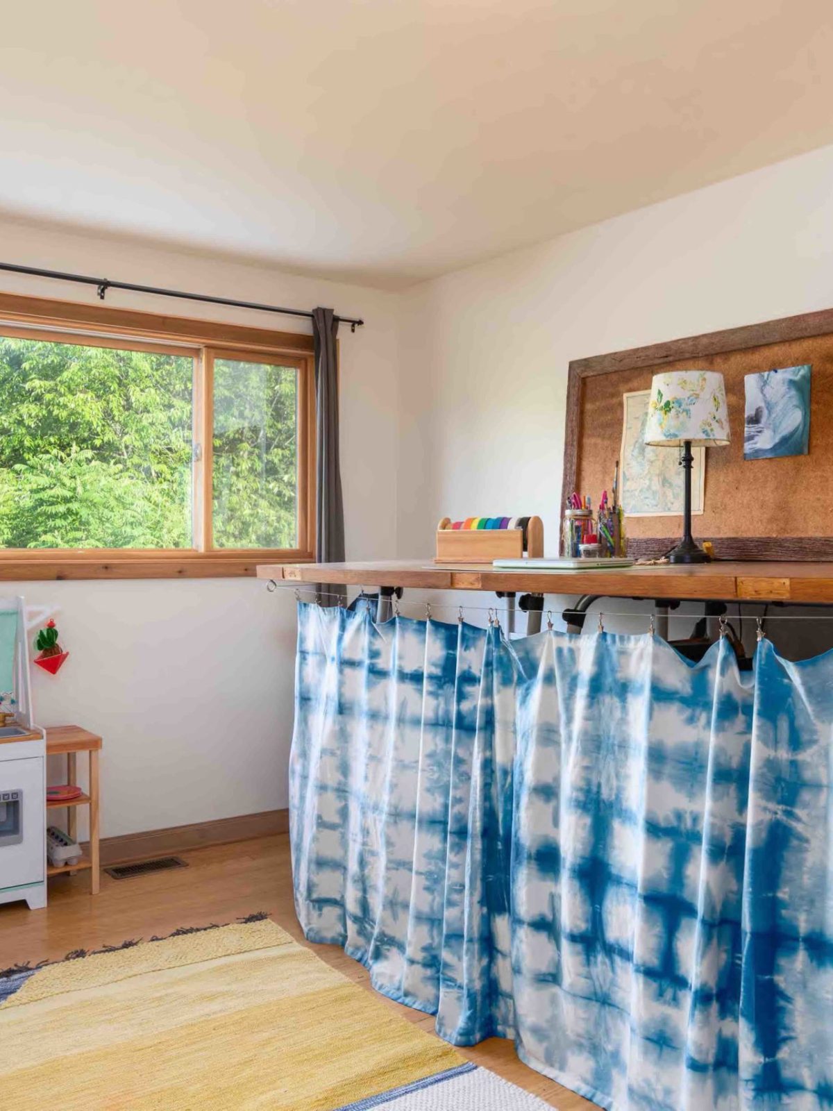 a bedroom with a large window