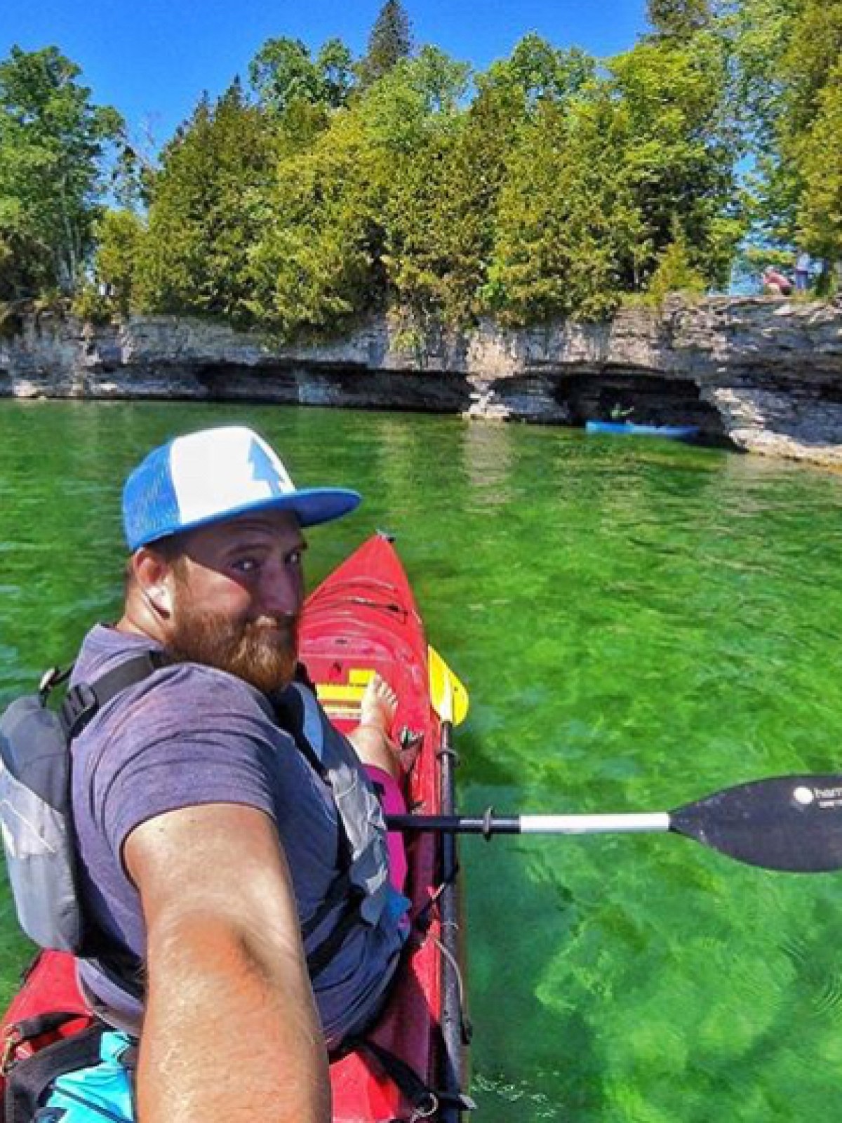 a person rowing a boat in the water